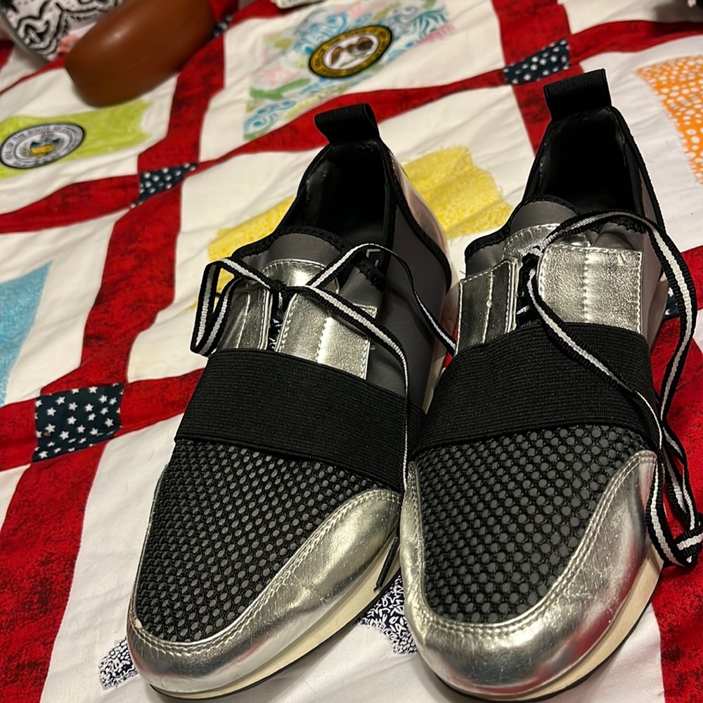 Black so her and gray and white shoes